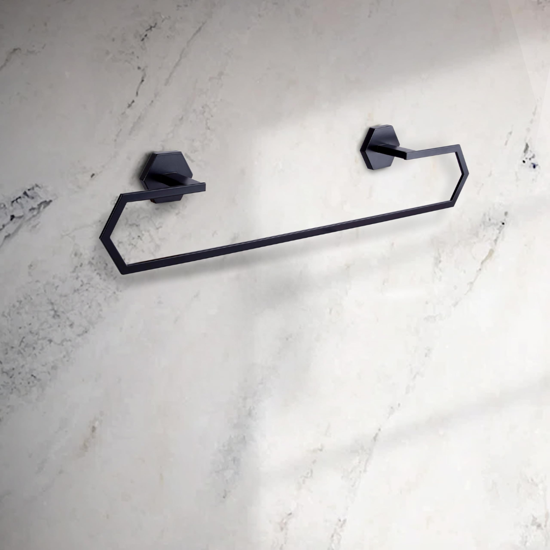 Modern matte black towel bar with angular geometric design mounted on a light marble bathroom wall.